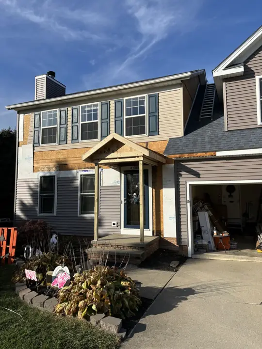 Exterior renovation, in progress exterior view