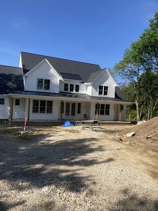 Whole-home exterior, in progress exterior view
