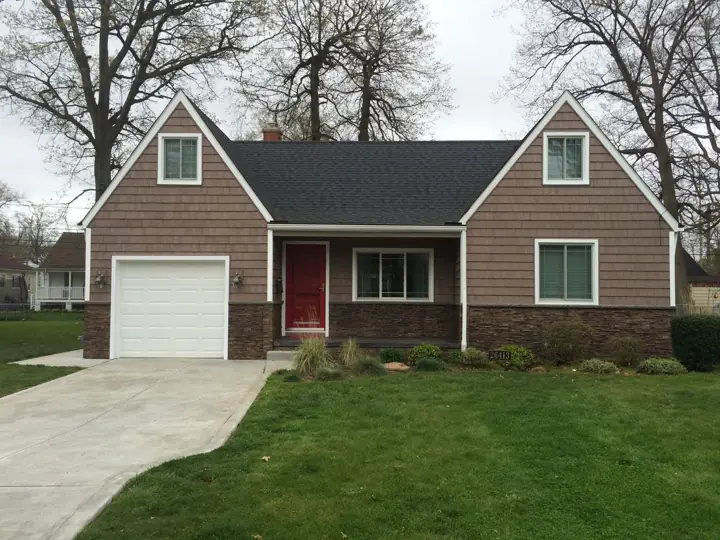 Cape Cod transformation, finished exterior view