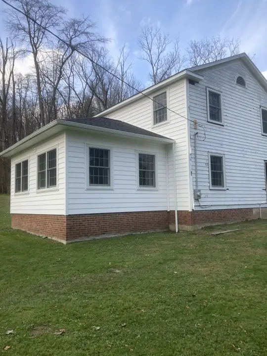 White addition and exterior, finished exterior view